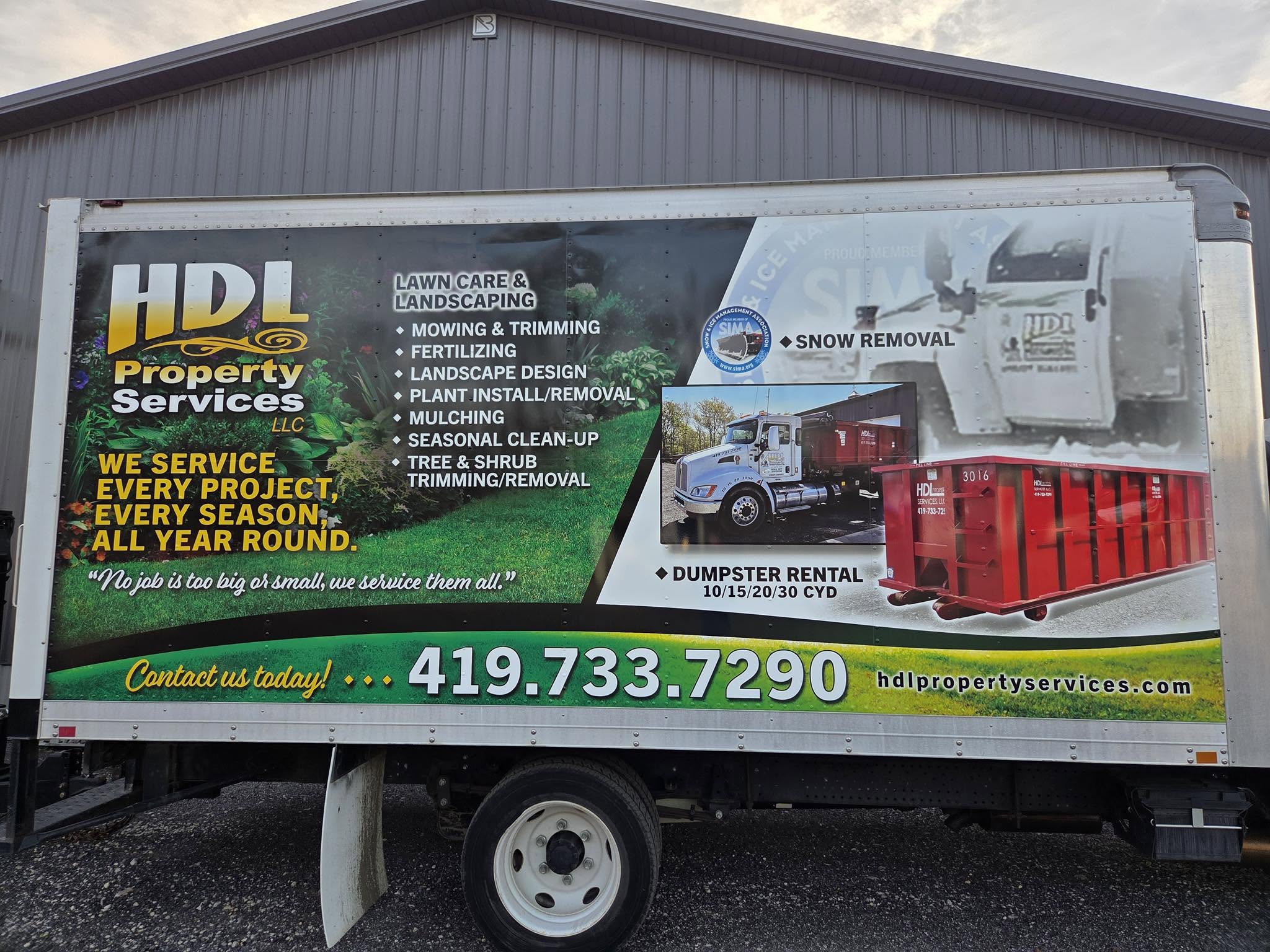 HDL Property Services branded truck listing lawn and garden services, Saint Marys Ohio